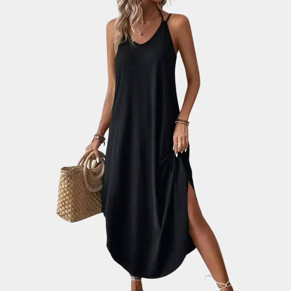 Versatile women's black V-neck cami dress, a flowy summer style for elegant casual outings or evening parties.