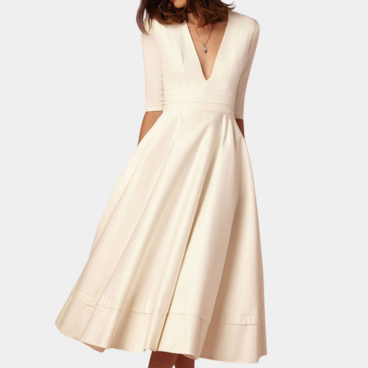 Women's sleeveless A-line midi dress with elegant side slit, perfect for versatile casual & chic summer style.