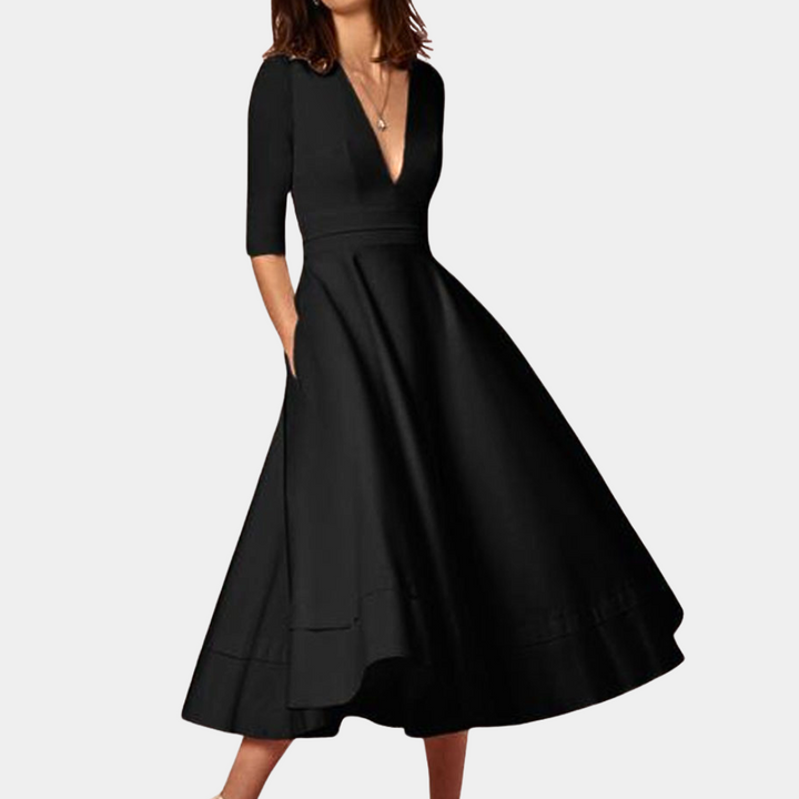 Effortless women's A-line midi dress with side slit. Sleeveless design, ideal for spring and summer elegance.