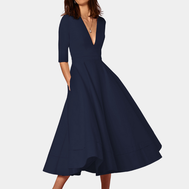 Chic women's sleeveless A-line midi dress. Timeless design with a flattering silhouette and stylish side slit.