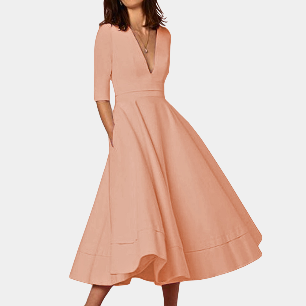 Casual yet elegant women's A-line midi dress, sleeveless and versatile. Features a comfortable side slit.