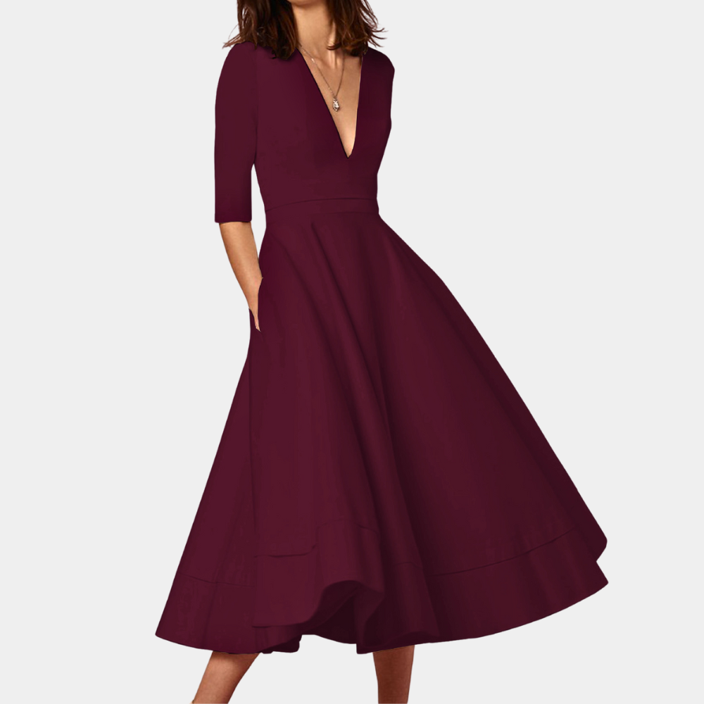 Stylish women's sleeveless A-line midi dress with a modern side slit, suitable for both casual and dressy occasions.