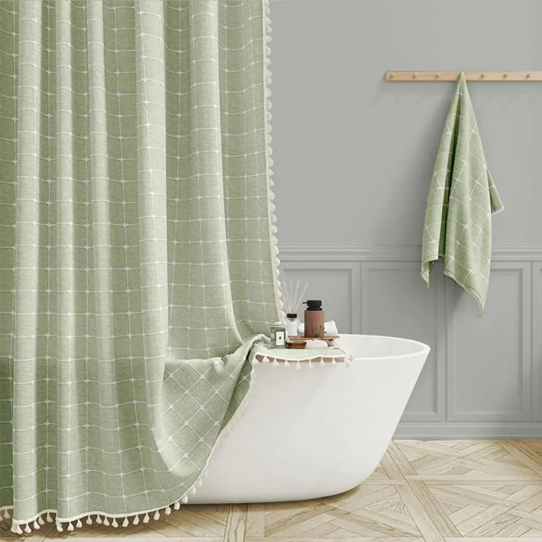 Waterproof Bohemian Farmhouse shower curtain with decorative tassels, ensuring durability and style in your bathroom.