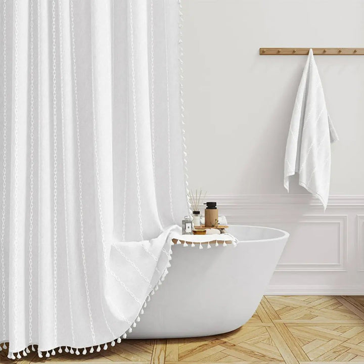 Privacy-enhancing Bohemian Farmhouse shower curtain, waterproof with stylish tassels, ideal for rustic bathroom decor.