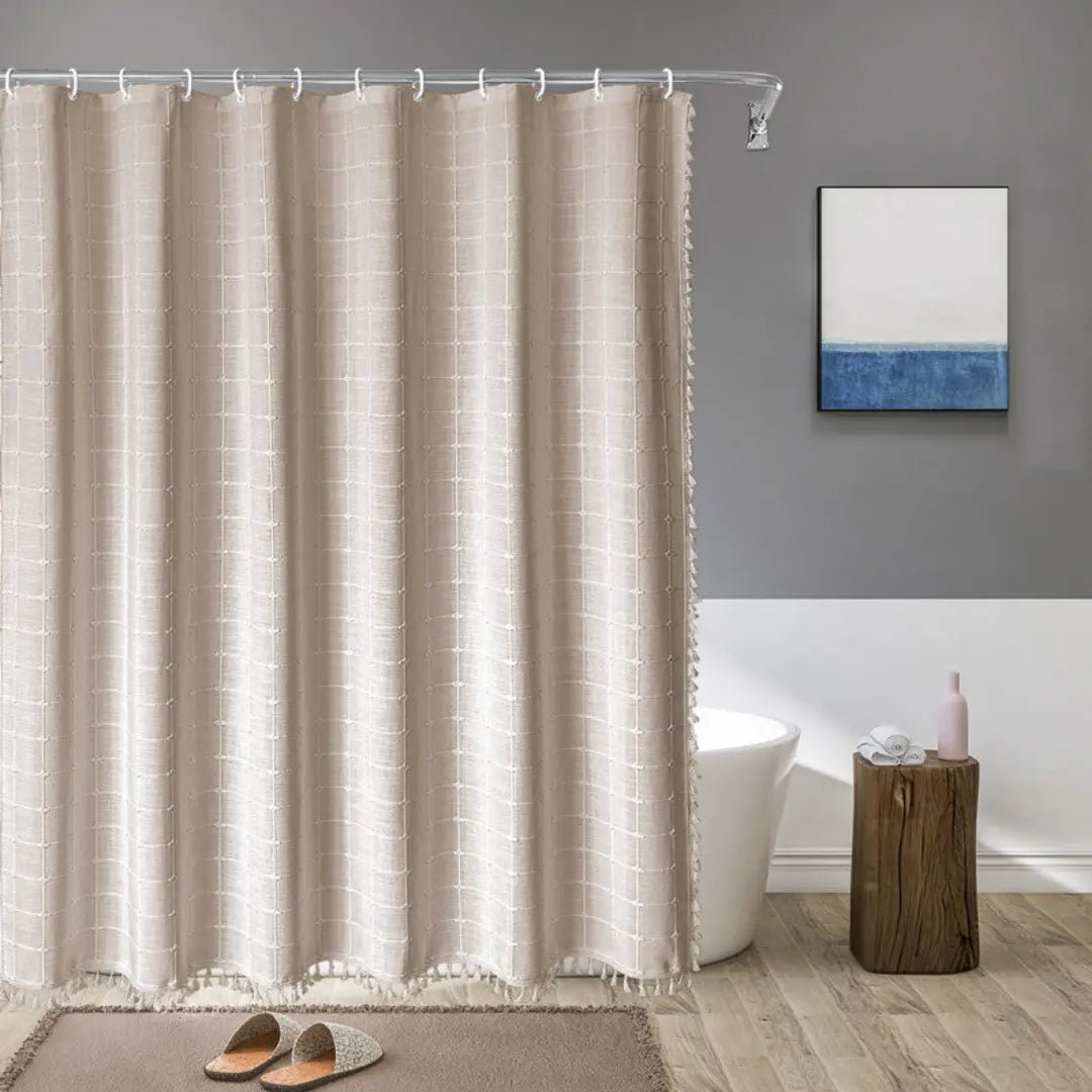 Bohemian Farmhouse shower curtain with tassels, waterproof. Enhances bathroom decor with rustic charm & privacy.