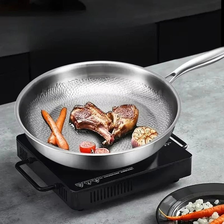 Healthy cooking titanium non-stick frying pan with hammered design. Ideal for all hobs, including induction.
