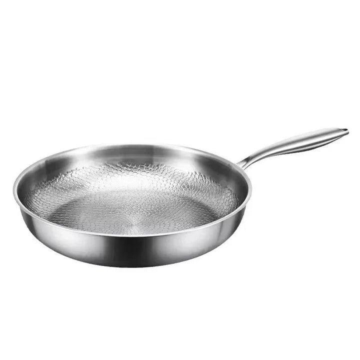 Sturdy hammered titanium non-stick frying pan. Induction-ready cookware for efficient and healthy everyday meals.