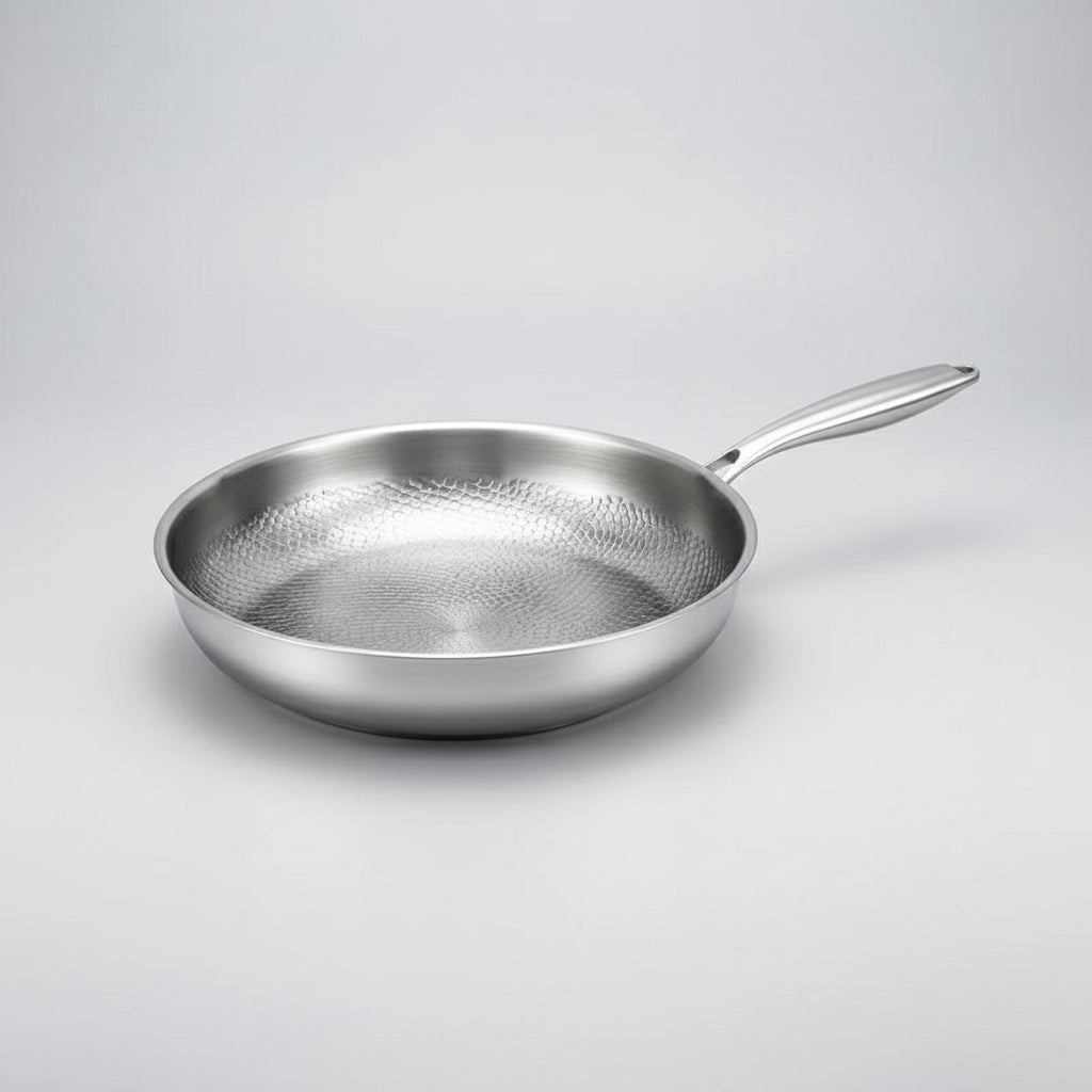 Premium hammered titanium non-stick frying pan. Induction compatible skillet for durable, healthy kitchen use.