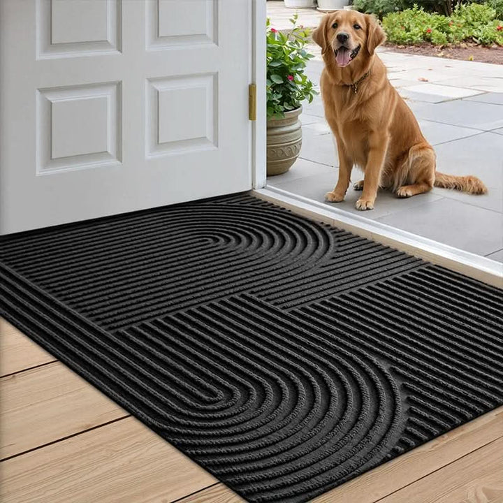 Non-slip absorbent floor mat with a unique flowing line pattern. Washable and pet-friendly for any entryway.