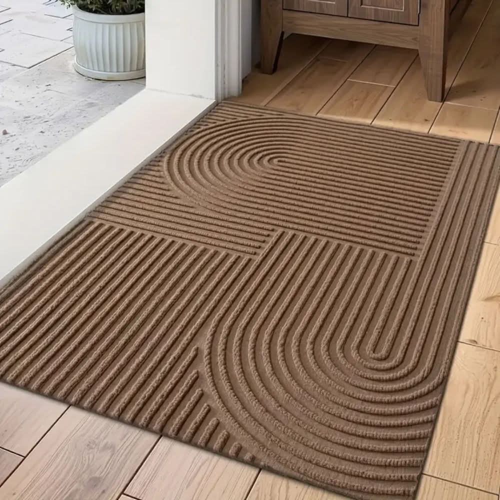 Washable mudroom mat, highly absorbent with elegant flowing lines. Non-slip doormat for pet-friendly homes.