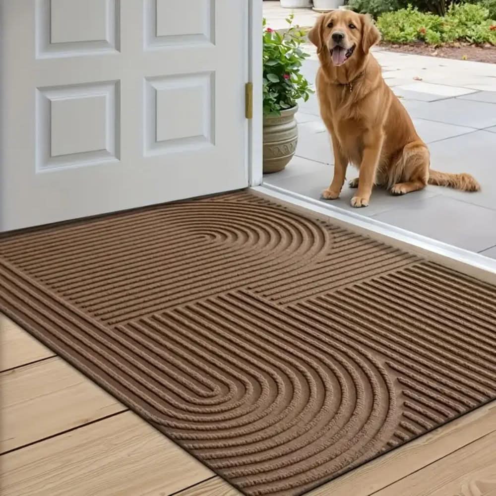 Sleek washable doormat with flowing line design. Absorbent & non-slip, perfect for kitchen or front door.