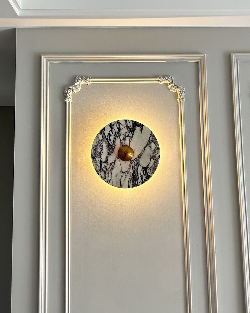 Decorative 9-inch marble wall light with warm white LED, vintage design, enhances any elegant room.