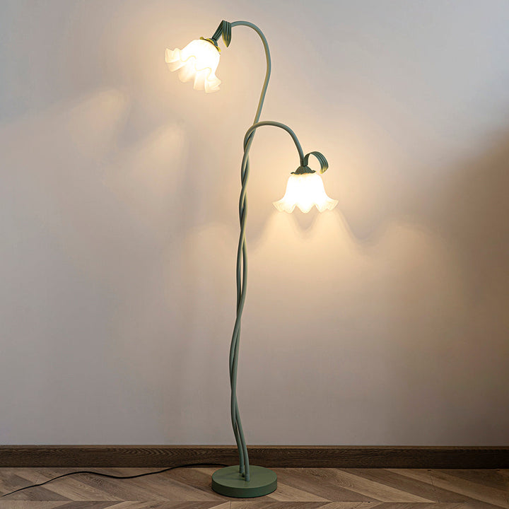 Green floral floor lamp with white shade, modern botanical light for living room.