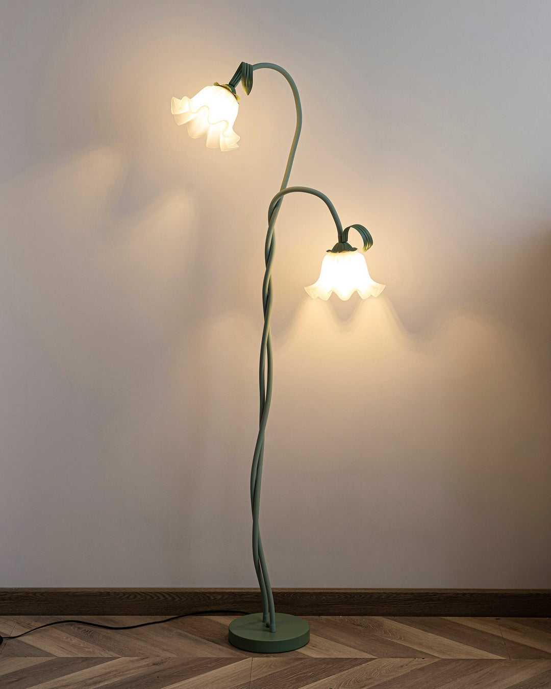 Ambient green floral floor lamp, white shade, contemporary botanical decor accent.