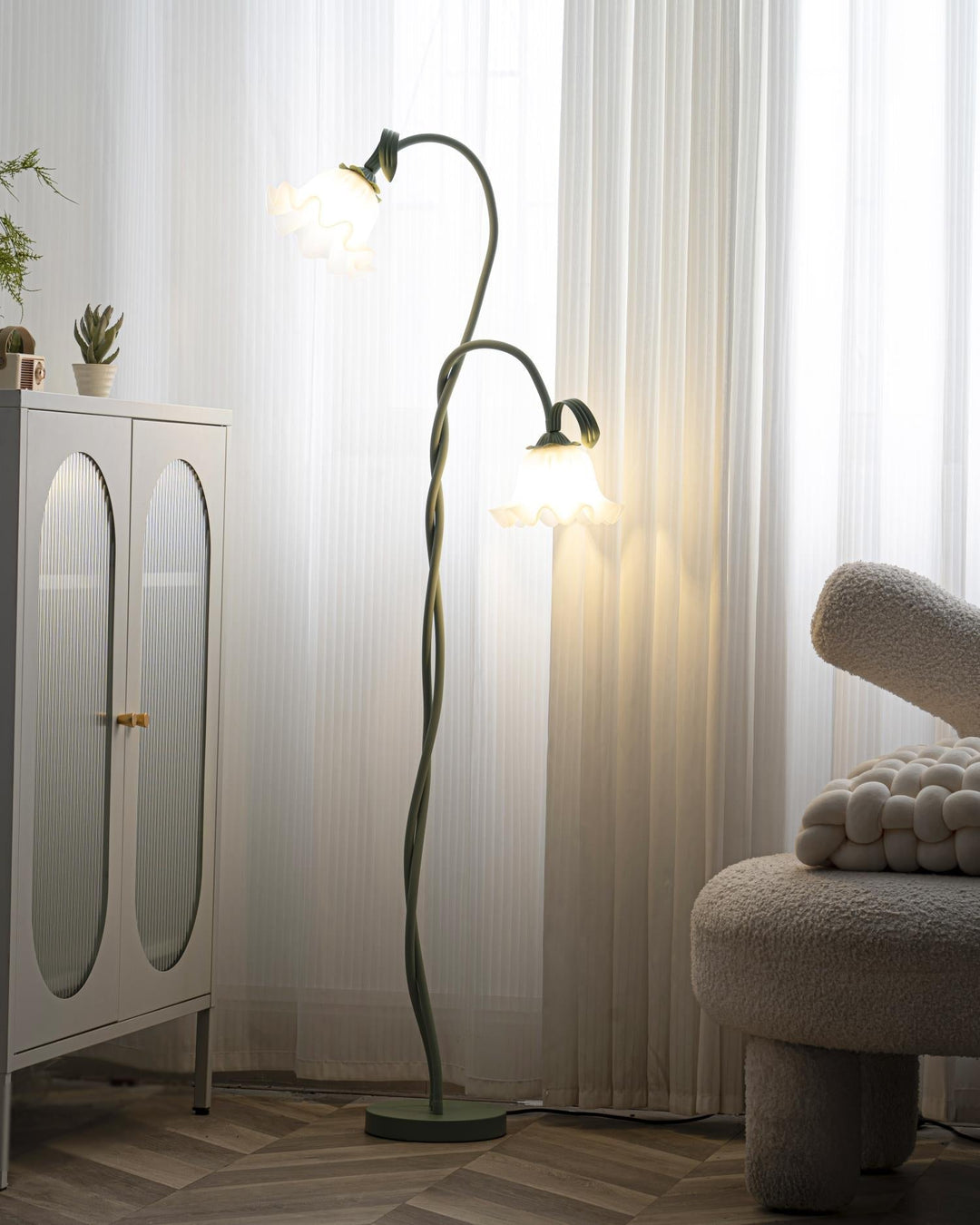 Floor lamp: Green botanical, subtle floral elements, modern aesthetic, white shade.