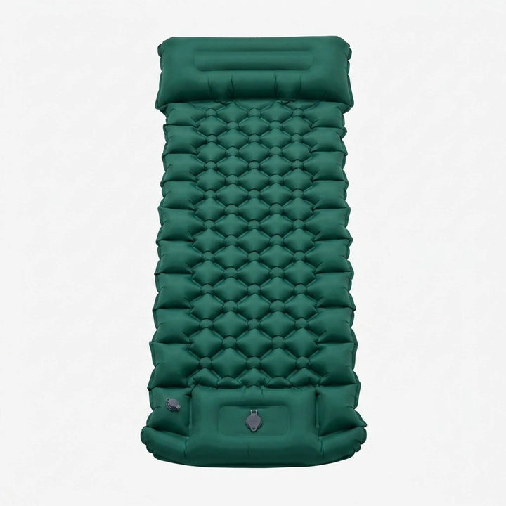 Portable camping sleeping pad rolled up with integrated pillow, ideal compact gear for hiking & travel.