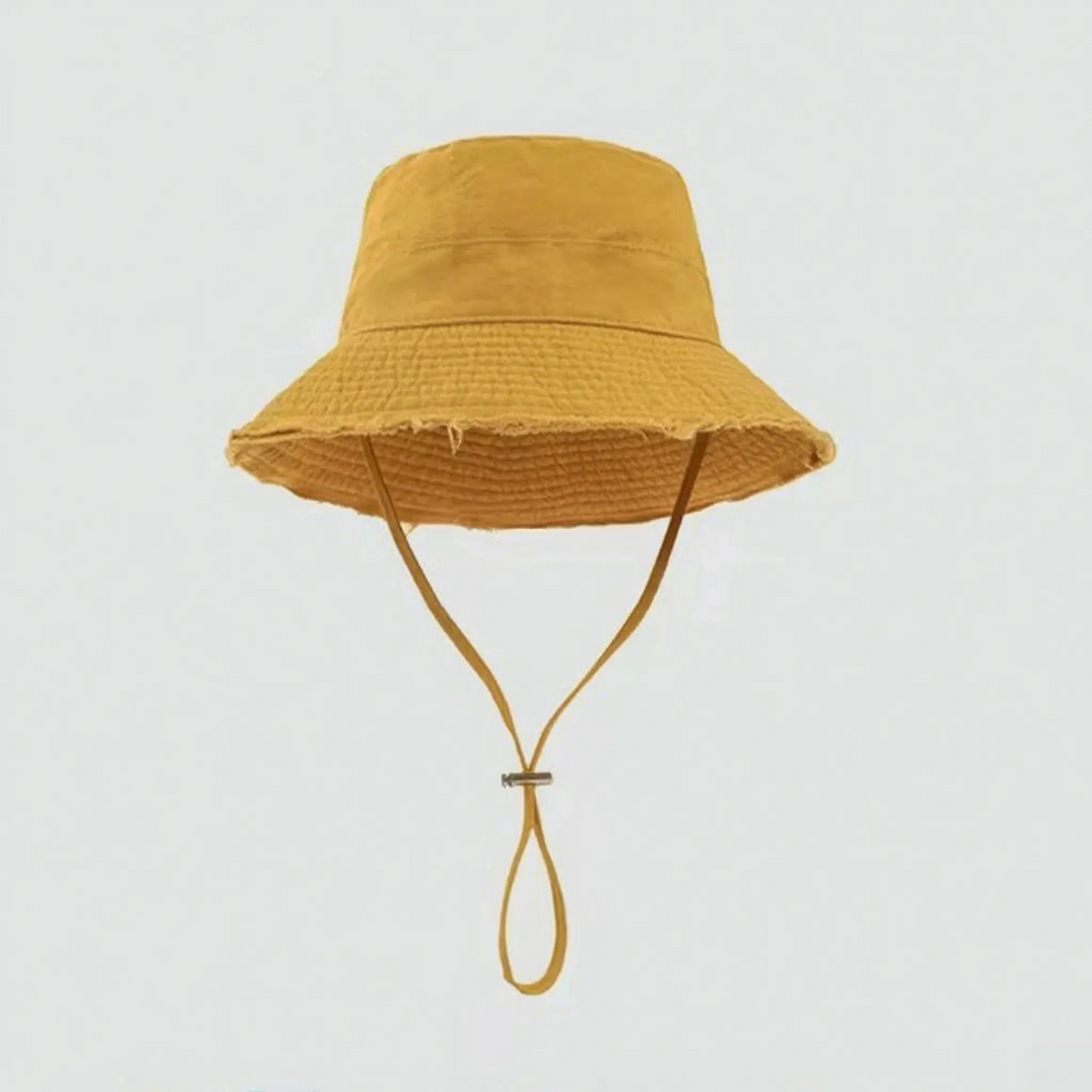 Women's versatile bucket hat, adjustable chin strap, frayed brim. Ideal summer, beach, travel sun protection.