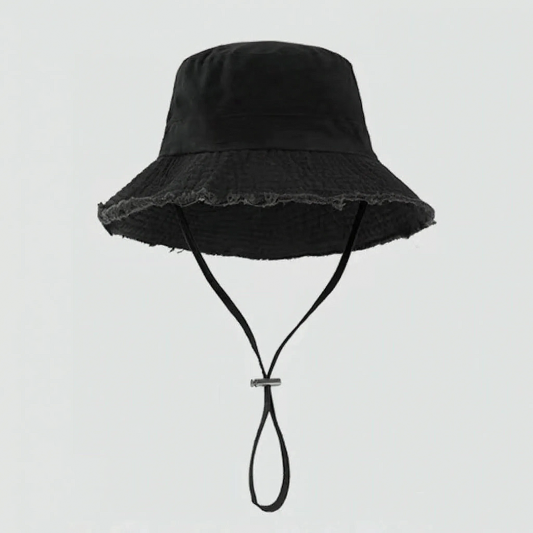 Women's adjustable bucket hat with chin strap, perfect for outdoor adventures, keeping sun off.