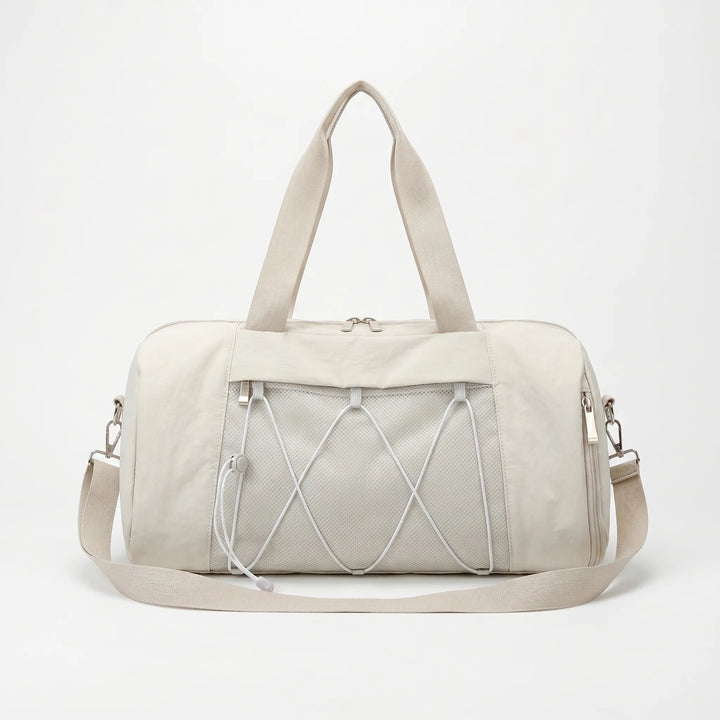 Durable nylon unisex duffel bag for gym, sports, and weekend travel. Perfect for activewear.