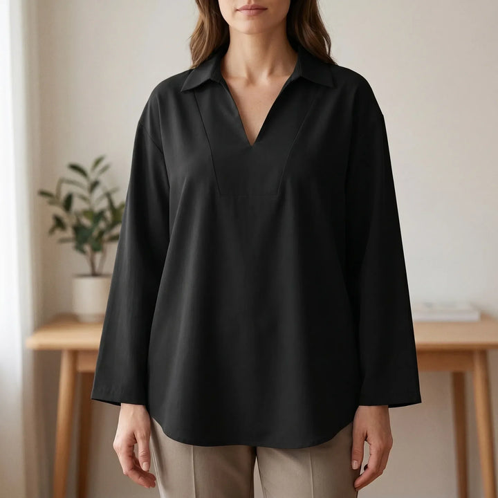 Women's casual high-low tunic top with long sleeves, v-neck, and relaxed fit. Perfect for everyday wear.