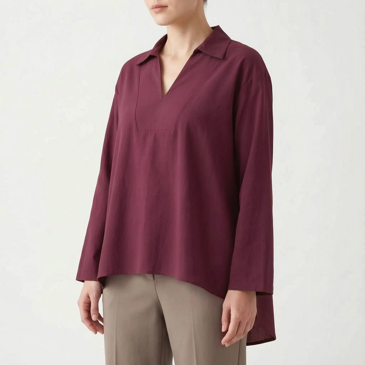 Effortless women's v-neck casual tunic. Long sleeve, high-low hem top in a relaxed fit for daily fashion.