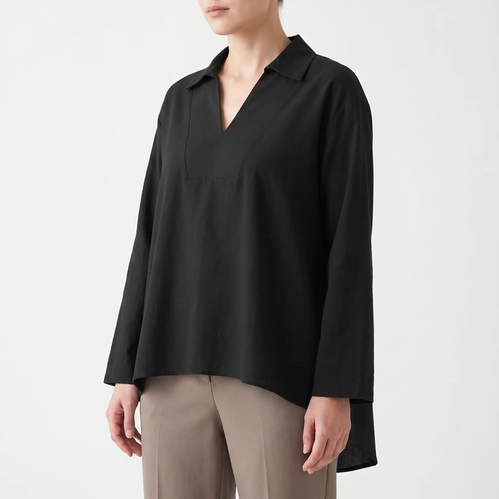 Women's long sleeve v-neck high-low tunic. Relaxed fit casual blouse, ideal for effortless everyday wear.
