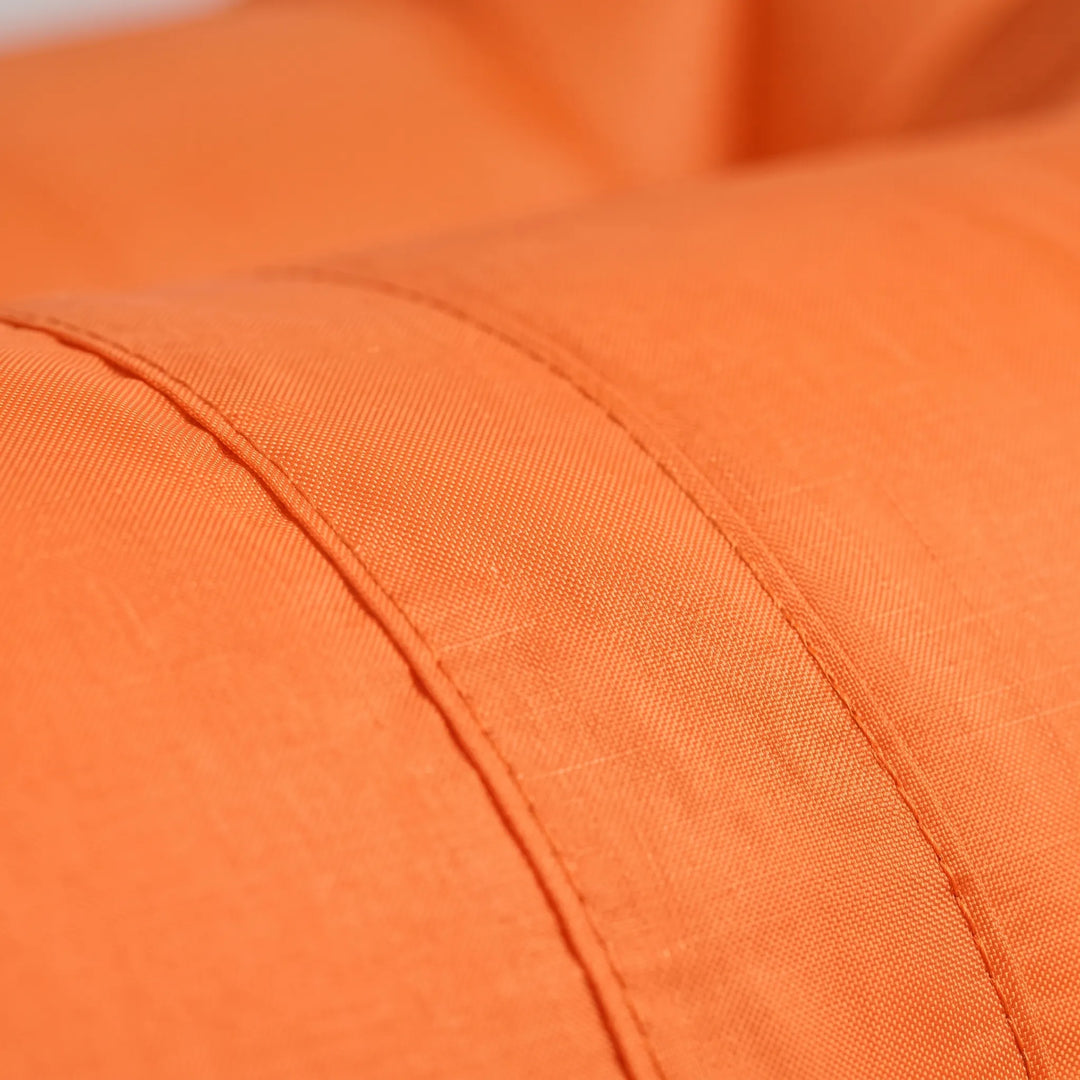 Camping in a park with an adult portable inflatable air lounger, an easy-inflate outdoor sofa.