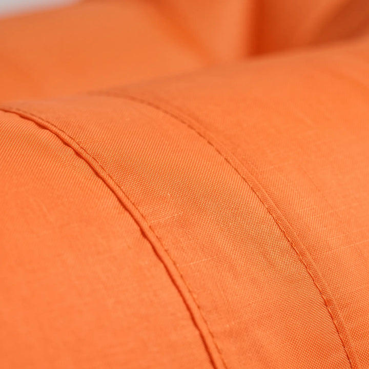 Camping in a park with an adult portable inflatable air lounger, an easy-inflate outdoor sofa.
