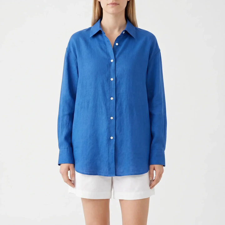 Chic women's oversized blue summer blouse, loose long sleeve fit & lightweight fabric, ideal as a casual shirt.
