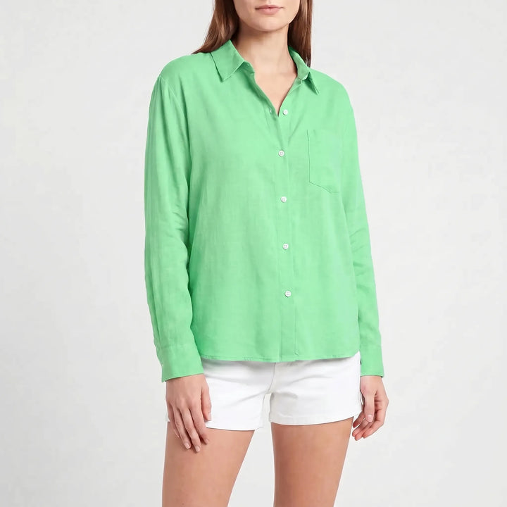 Chic long-sleeve button-up blouse for women, a stylish and versatile top for spring fashion.