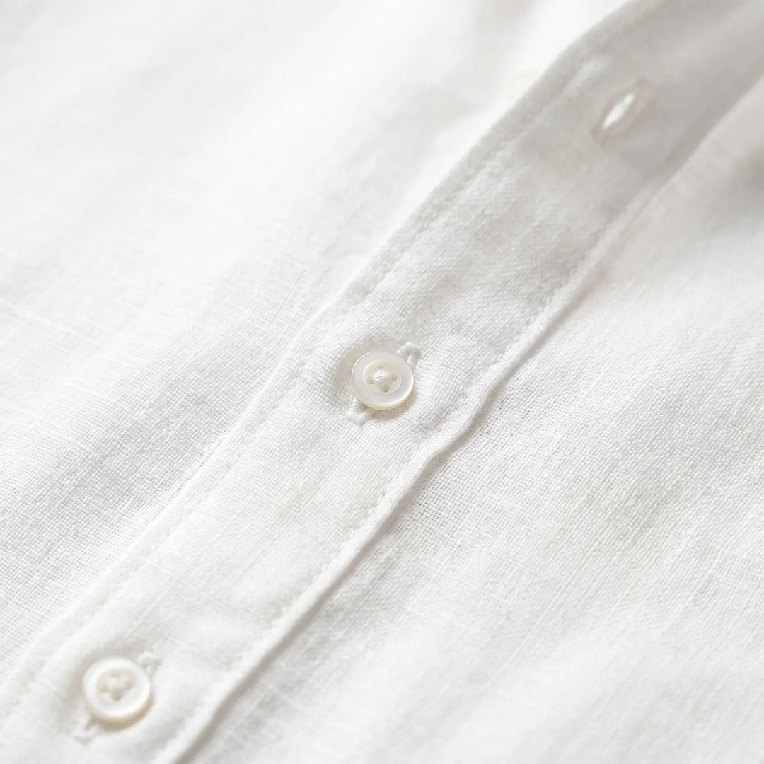 Lightweight, breathable men's long-sleeve button-up shirt, a versatile choice for casual warm-day comfort.