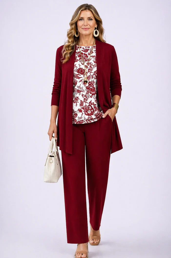 Fashionable women's elegant 3-piece set for office or event. Blazer, top, and trousers combo.