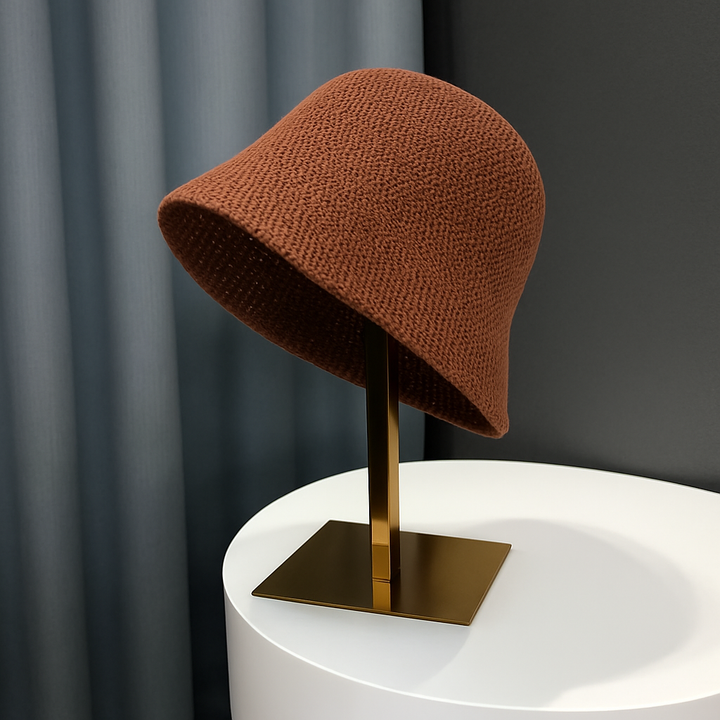 Comfortable women's summer bucket hat with UV protection. Breathable hollow knit, ideal for beach, travel, or casual outings.
