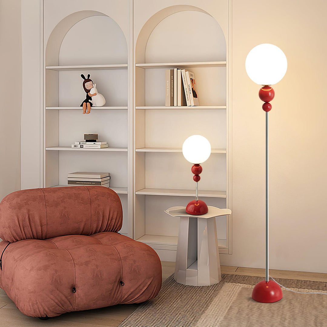Sleek design green floor lamp, metal and glass, enhancing modern home aesthetics.