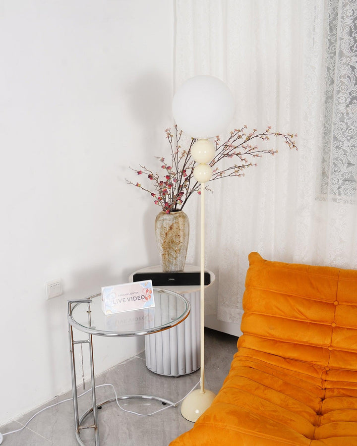 Ambient metal & glass floor lamp, offering stylish lighting for contemporary spaces.