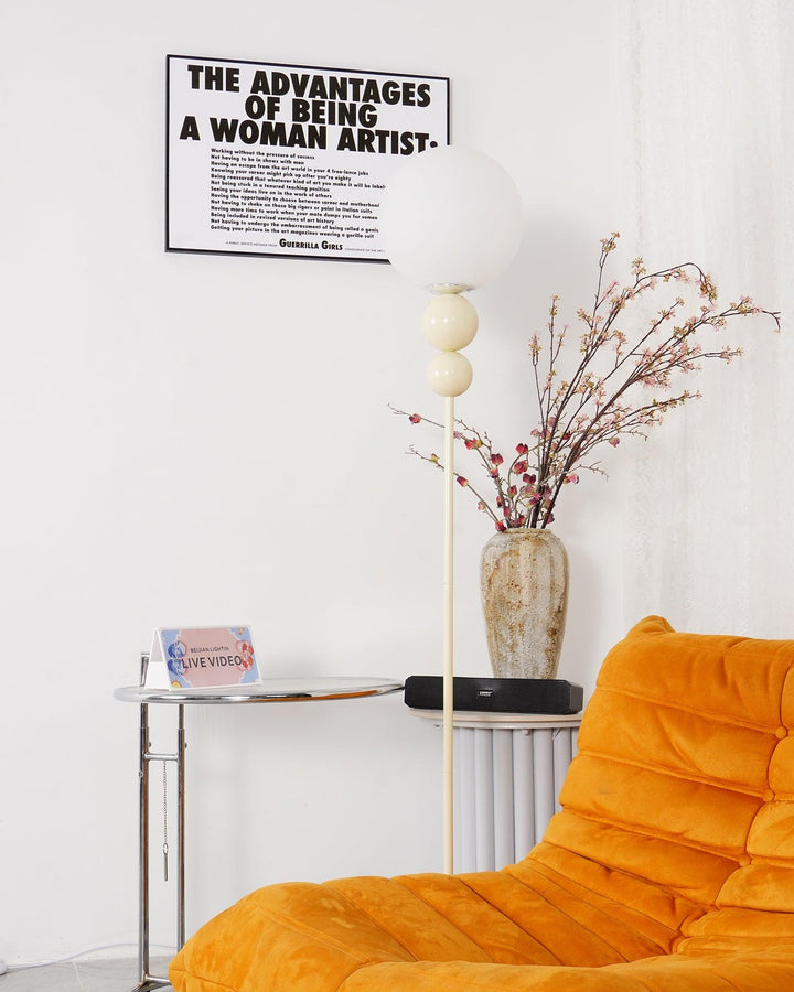 Contemporary milky white floor lamp, metal and glass, perfect for a cozy bedroom light.