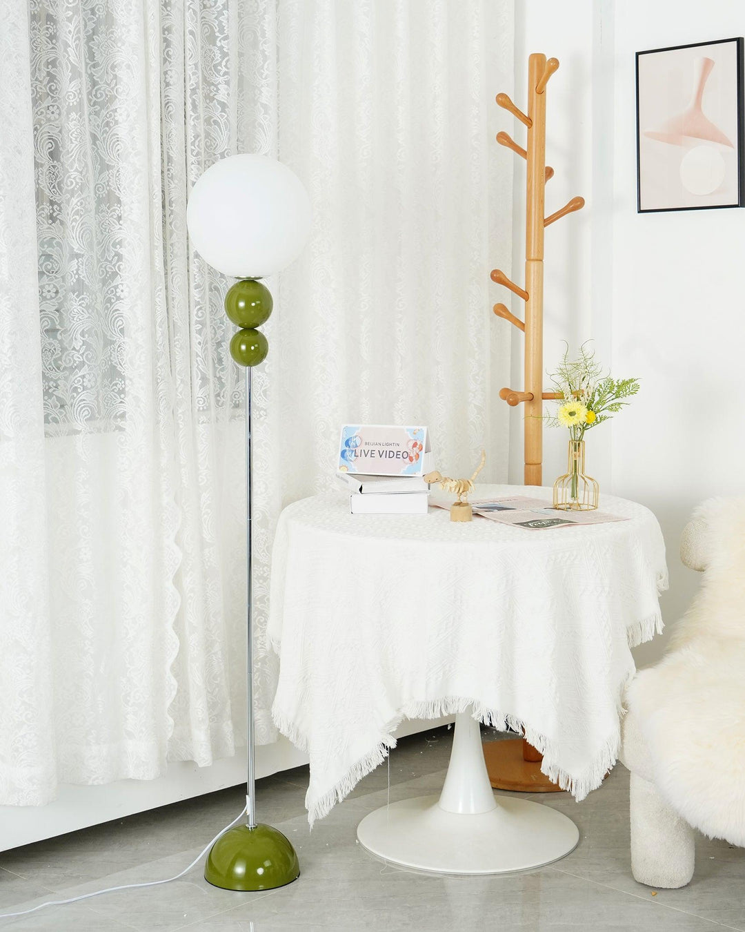 Green glass & metal floor lamp, a striking modern piece for living room decor.