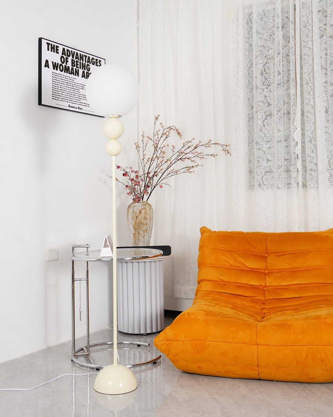 Green modern metal & glass floor lamp, sleek design for elegant living rooms.