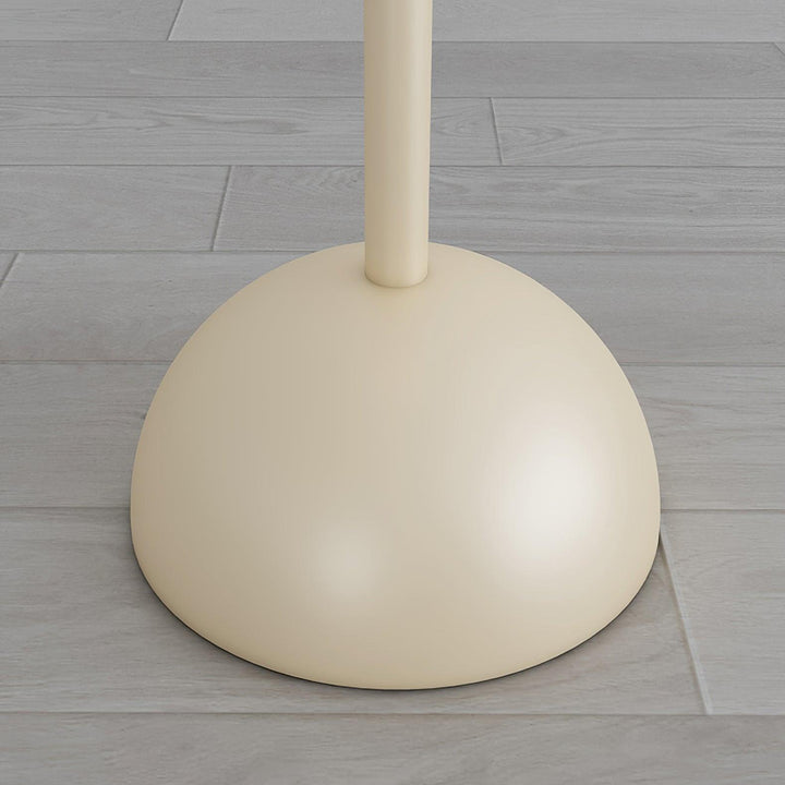 Elegant indoor red metal & glass floor lamp, ideal for modern bedroom ambiance.