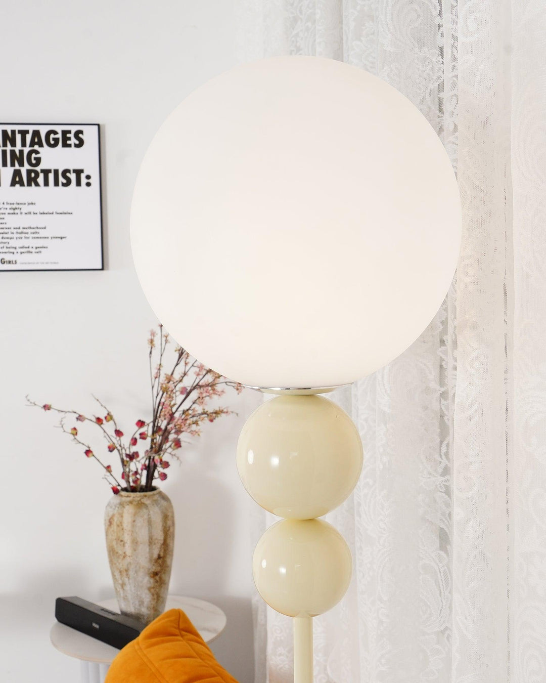 Red contemporary floor lamp with metal & glass, perfect for home accent lighting.