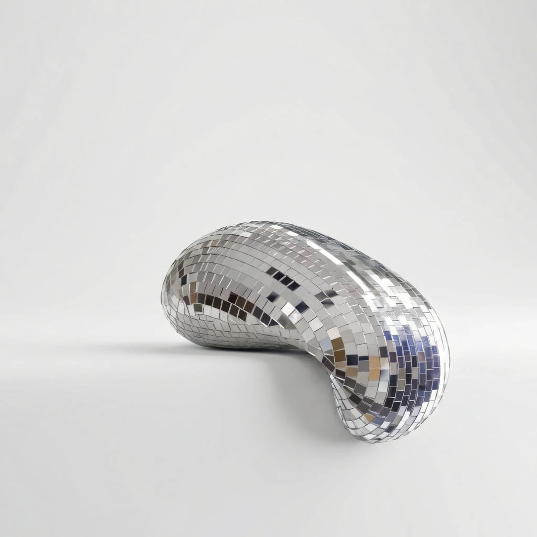 Modern LustraCurl tabletop sculpture; dynamic light art & reflective decor, a unique contemporary gift for home.