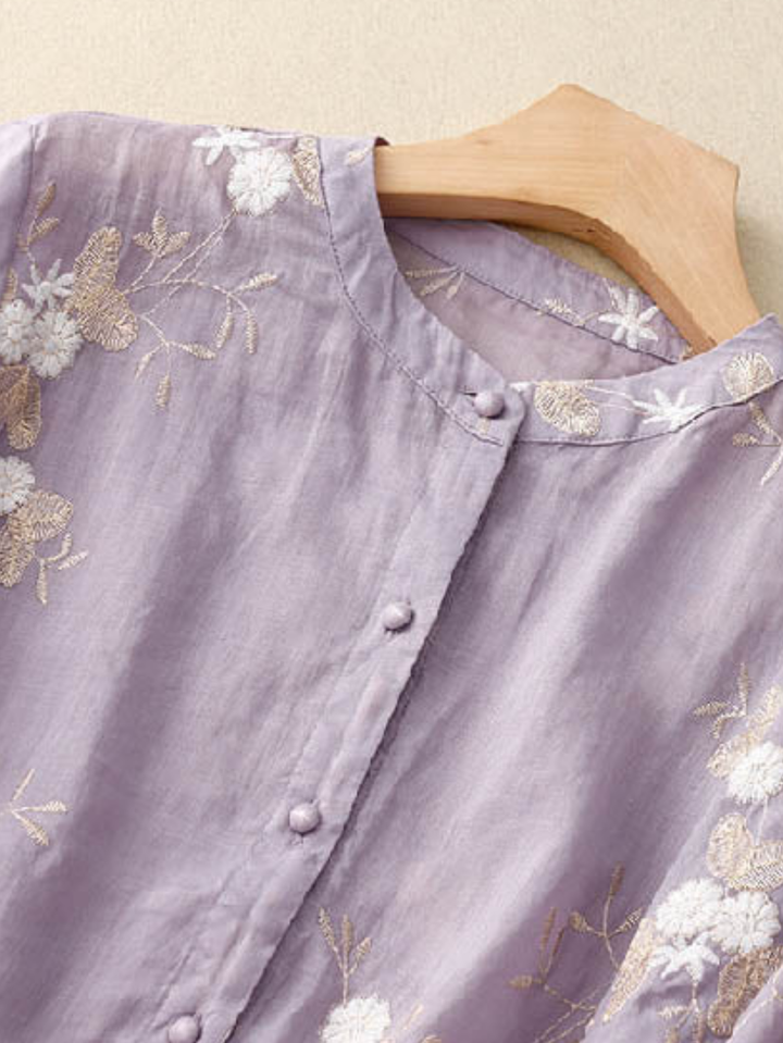 Casual chic women's long sleeve embroidered blouse, loose fit, round neck, for comfort.