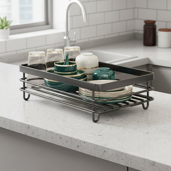 Space-saving foldable dish rack for kitchen countertops, stainless steel, perfect for drying dishes efficiently.