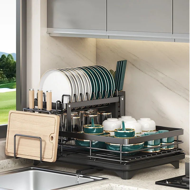 Countertop space-saving foldable dish rack for kitchen organization, stainless steel, ideal for drying various kitchen items.