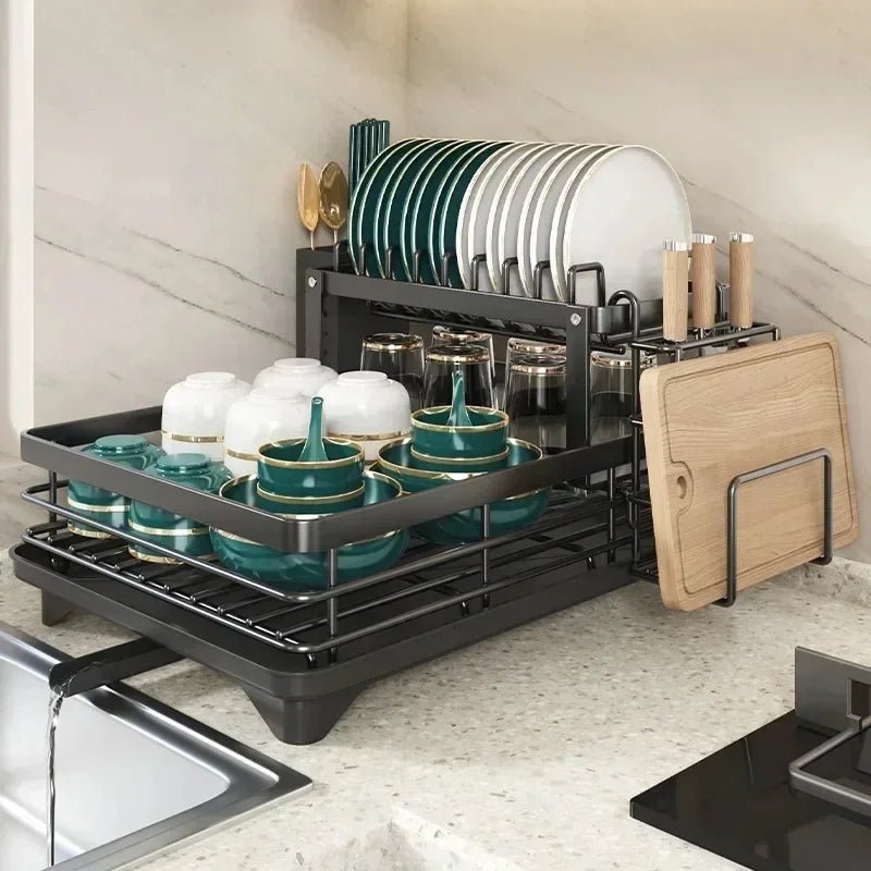 Stainless steel foldable dish drying rack, perfect for space-saving kitchen storage and organization on countertops.