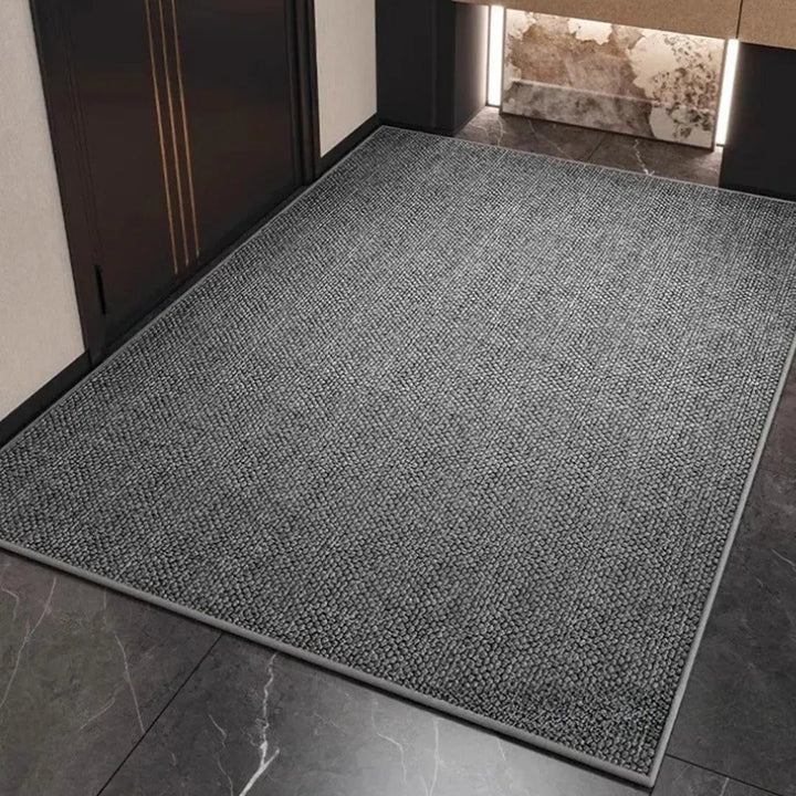 Durable, washable absorbent floor mat with a stylish, modern design, perfect for high-traffic indoor and outdoor areas.