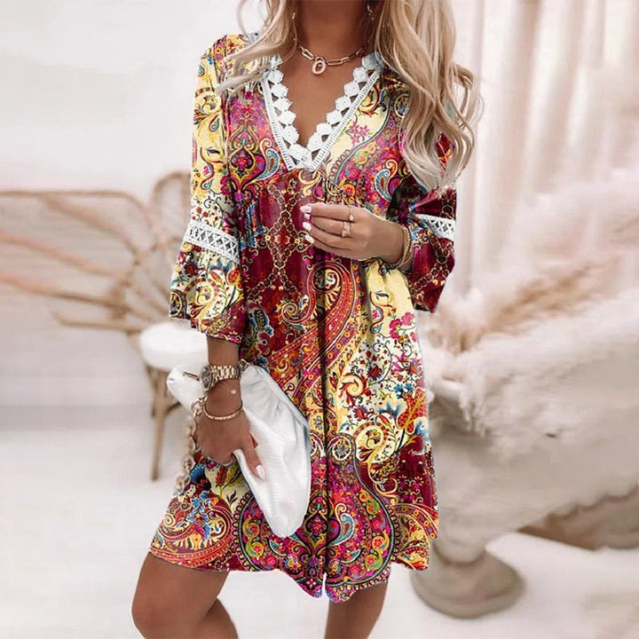 Elegant women's boho summer dress featuring delicate crochet details, V-neck, and a comfortable knee-length design.
