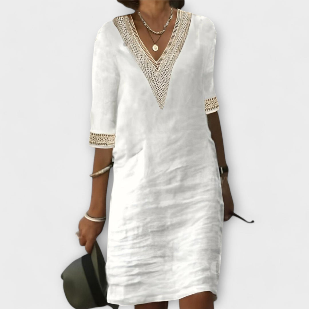Elegant women's crochet midi dress with openwork design, perfect for flowy comfort & boho chic summer style.