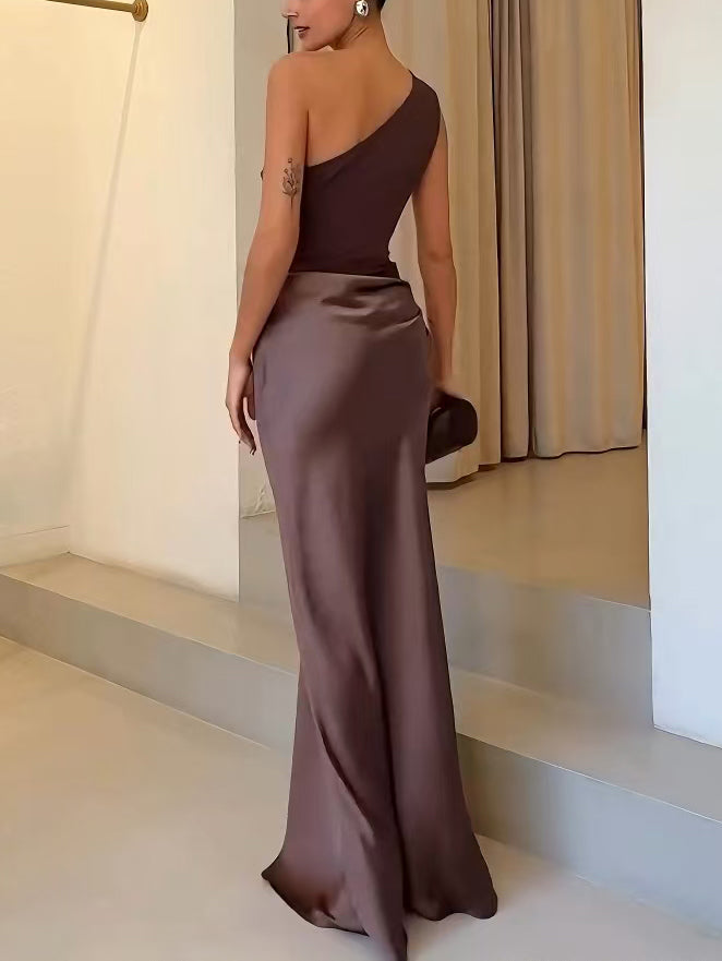 Asymmetric pleated maxi dress for women, an elegant and flowing long dress suitable for formal events.
