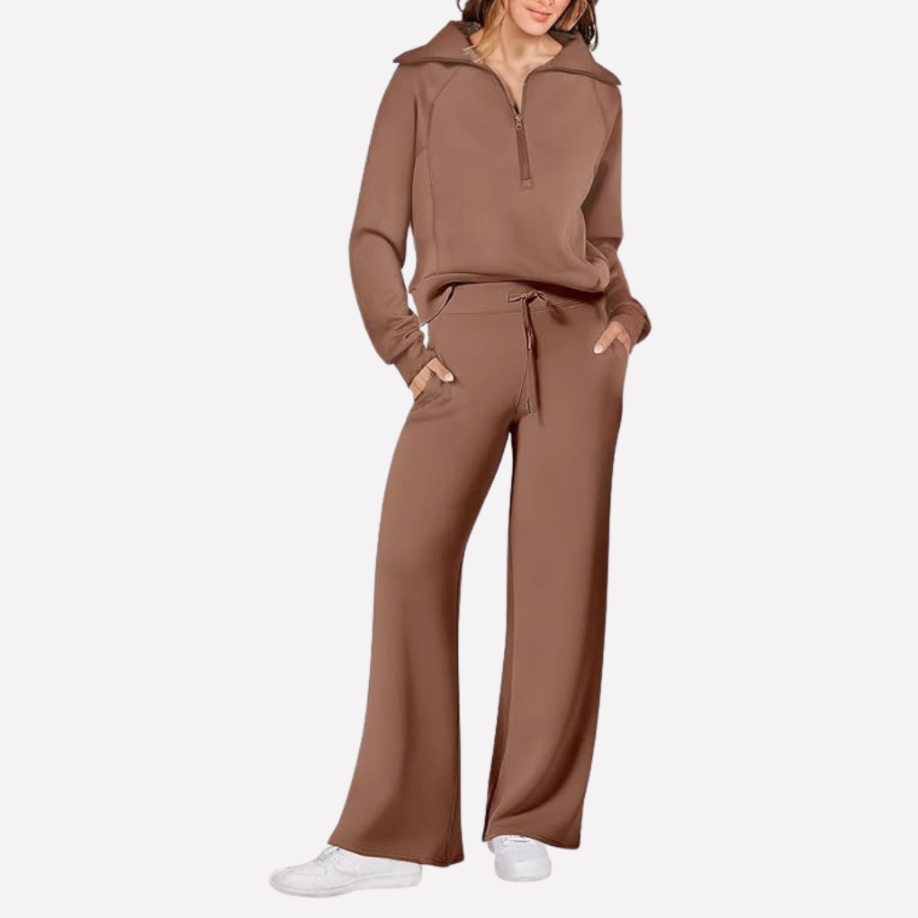 Women's fashion travel outfit: elegant top & comfortable wide-leg pants. Perfect matching set for any adventure.